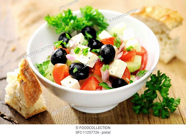 Greek salad with black olives and feta cheese