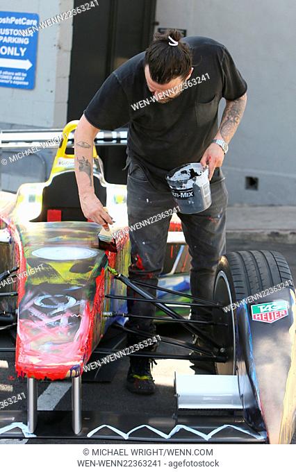 Domingo Zapata paints a Formula E car on Sunset Boulevard across from Chateau Marmont Featuring: Domingo Zapata Where: Los Angeles, California
