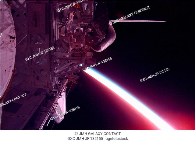 The sun sets on Earth's horizon in this electronic still camera's view photographed on STS-85 flight day 8 aboard the Space Shuttle Discovery