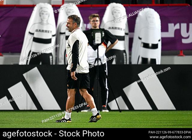 26 November 2022, Qatar, Doha: Soccer, World Cup 2022 in Qatar, final training Germany, Germany's national coach Hansi Flick during final training before the...