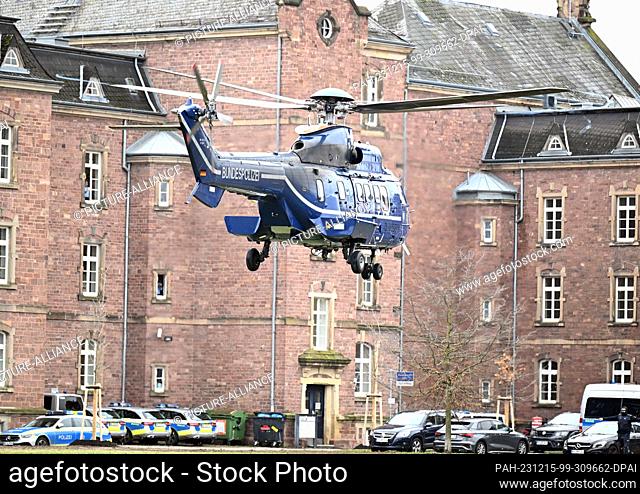 15 December 2023, Baden-Württemberg, Karlsruhe: A Federal Police helicopter with two detainees on board lands in Karlsruhe