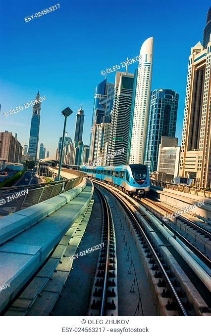 DUBAI, UAE - NOVEMBER 18: Dubai Metro. A view of the city from the subway car nov 18. 2012. Dubai Metro as world's longest fully automated metro network (75 km)...