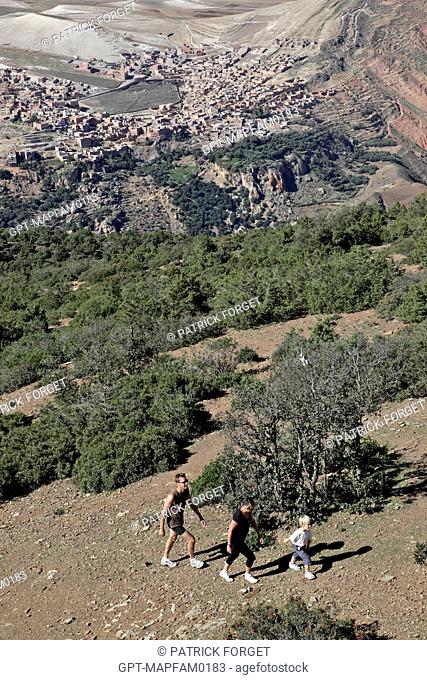 HIKING WITH A GUIDE ON THE DJEBEL KLELOUT MOUNTAIN, ONE OF THE ACTIVITIES AT THE DOMAINE DE TERRES D’AMANAR, TAHANAOUTE, AL HAOUZ, MOROCCO