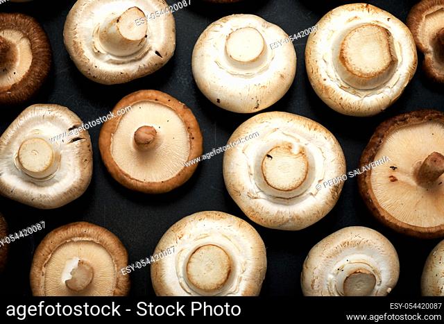 Mushrooms on a black table