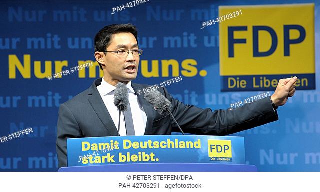 Chairman of the Free Democratic Party (FDP), Philipp Roesler, speaks at an election campaign event in Hanover, Germany, 19 September 2013