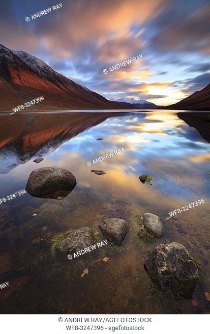 Sunset captured in early November from Gualachulain at the northern end of Loch Etive in the Scottish Highlands. A long shutter speed was used to blur the...