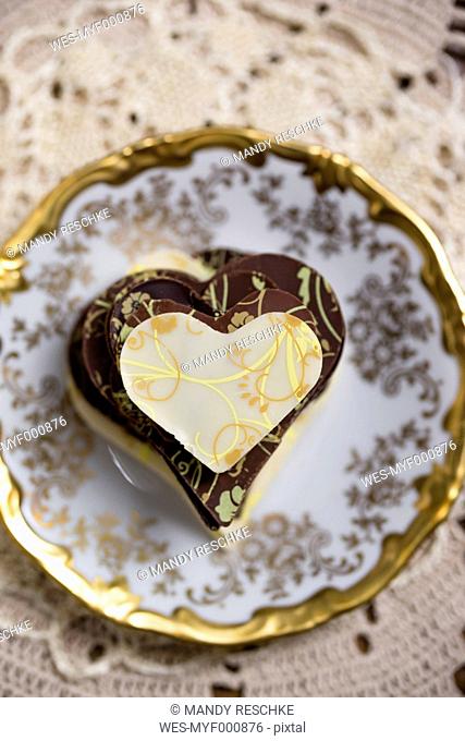Stack of homemade chocolate hearts on plate