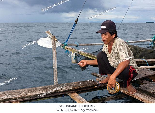 Fishermen living on Fishing Platform called Bagan, Cenderawasih Bay, West Papua, Indonesia