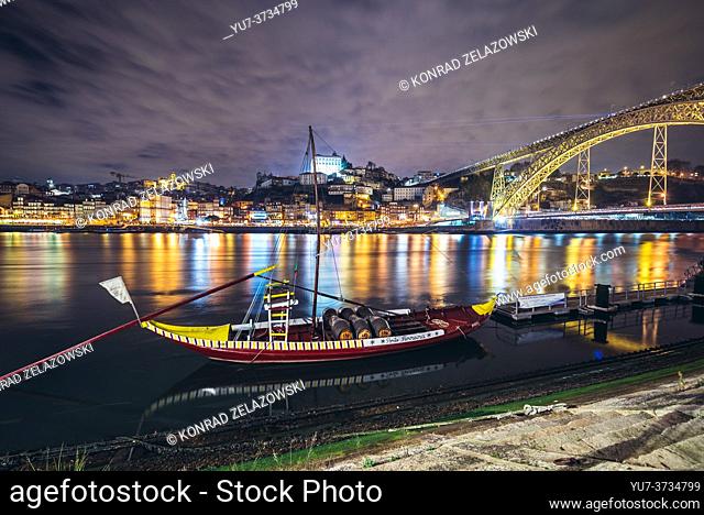 View from Vila Nova de Gaia city on Porto riverfront and so called Rabelo boat on Douro River, Portugal