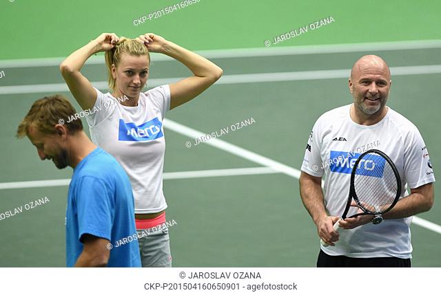 From left: Karolina Pliskova's coach Jiri Vanek, Czech tennis player Petra Kvitova and her coach David Kotyza train prior to the semifinal match of the world...