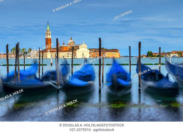 Gondolas Move with the Wind and Water on Venice Italy Grand Canal across from San Giorgio Maggiore World Location