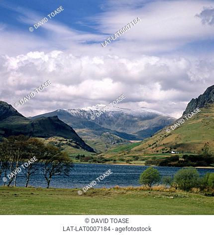 Llyn Nantlle Uchaf is a lake in the mountains of Snowdonia in the Snowdonia national park. Snow capped Mount Snowdon towers about it