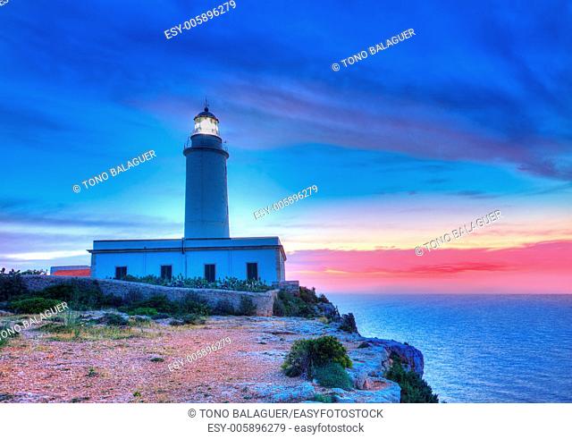 La Mola Cape Lighthouse Formentera at sunrise in Balearic Islands