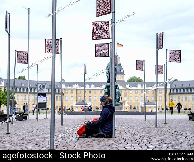 In Karlsruhe at the Platz für Grundrechte there are street signs with statements on the subject of law (artwork by Jochen Gerz)