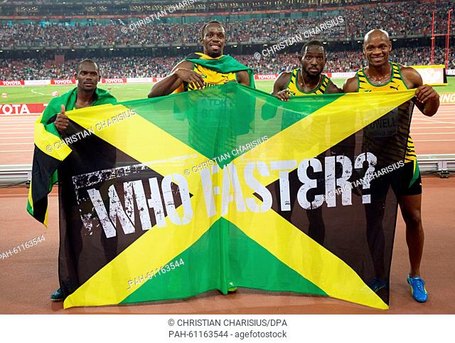 Jamaica's relay team with (L-R) Nesta Carter, Usain Bolt, Nickel Ashmeade and Asafa Powell, celebrate after winning the the 4 x 100m Relay final at the 15th...