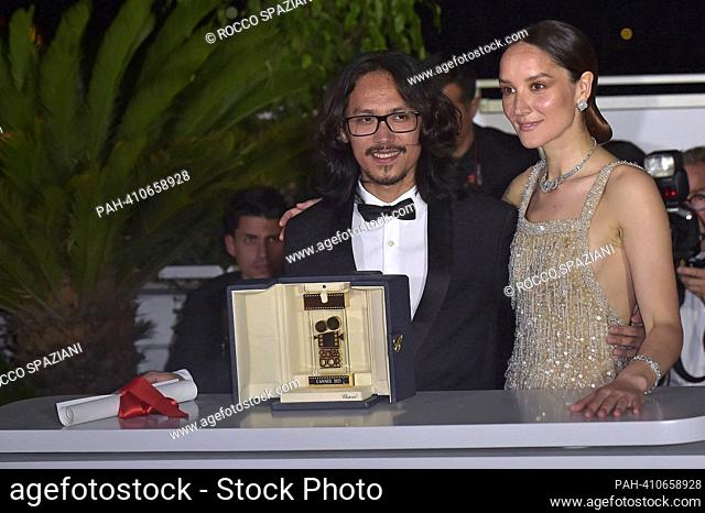 CANNES, FRANCE - MAY 27: Director Pham Thien An (L) poses with The Caméra d’or Award for 'Inside The Yellow Cocoon Shell' and President of the Camera d’Or Jury...