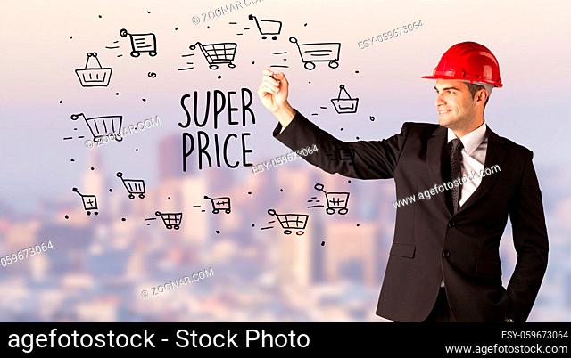 Handsome businessman with helmet drawing SUPER PRICE inscription, contruction sale concept