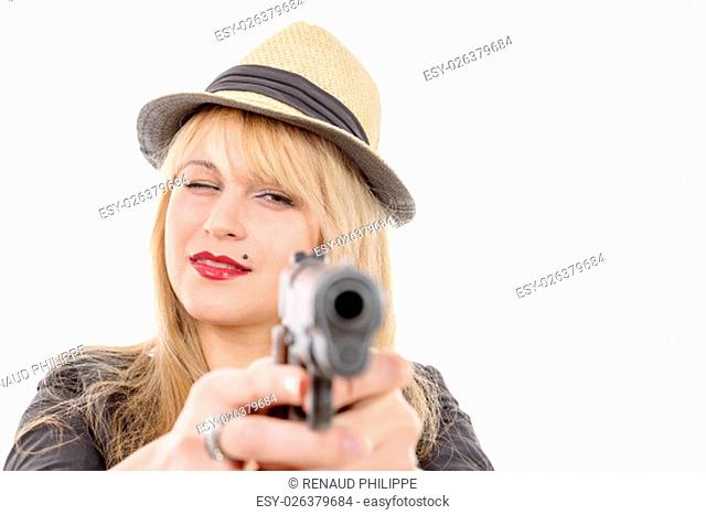 young pretty woman pointing a gun at the camera with one hand, isolated on white
