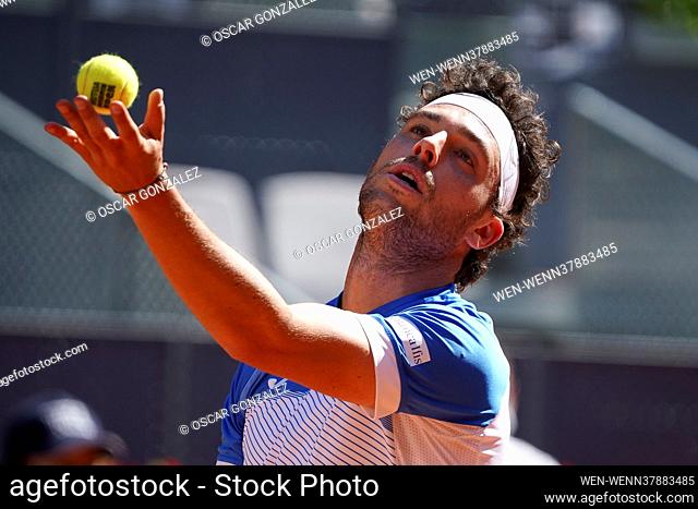 Marco Cecchinato in action during in his mens singles match against Roberto Bautista Agut of Spain during day six of the Mutua Madrid Open at La Caja Magica on...