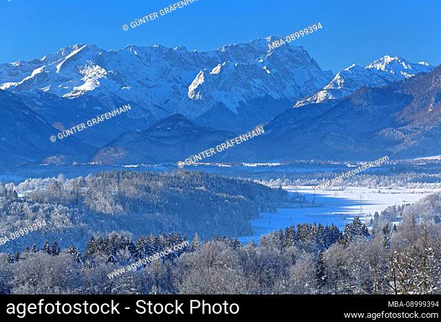 Winter landscape with a view of Murnauer Moos to mount Zugspitze, Riegsee, The Blue Land, Upper Bavaria, Bavaria, Germany