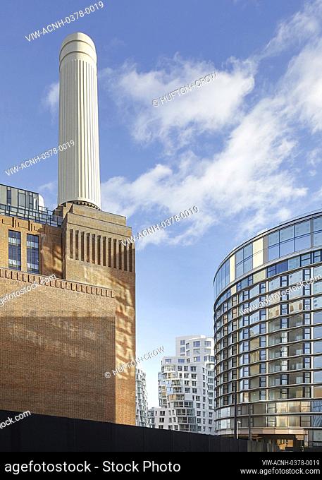 Old and new facades in juxtaposition. Prospect Place Battersea Power Station Frank Gehry, London, United Kingdom. Architect: Frank Gehry, 2022
