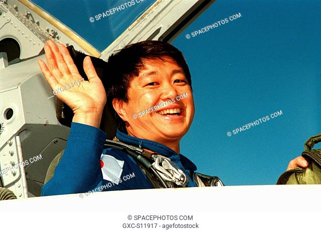 10/26/1998 --- STS-95 Payload Specialist Chiaki Mukai, with the National Space Development Agency of Japan NASDA, waves on her arrival at Kennedy Space Center's...