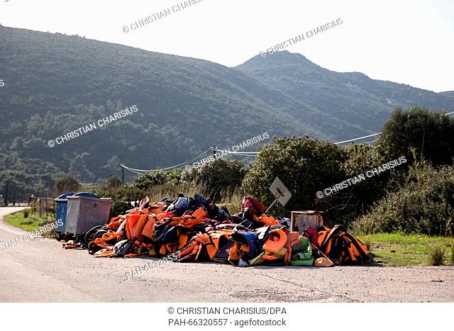 A mound of lifejackets beside a small street near Vathy on the island of Samos, Greece, 1 March 2016. Two German police boats will from now on support the Greek...