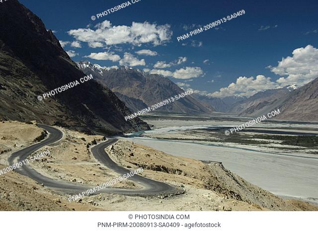Road passing through mountain ranges, Shyok River, Nubra Valley, Ladakh, Jammu and Kashmir, India