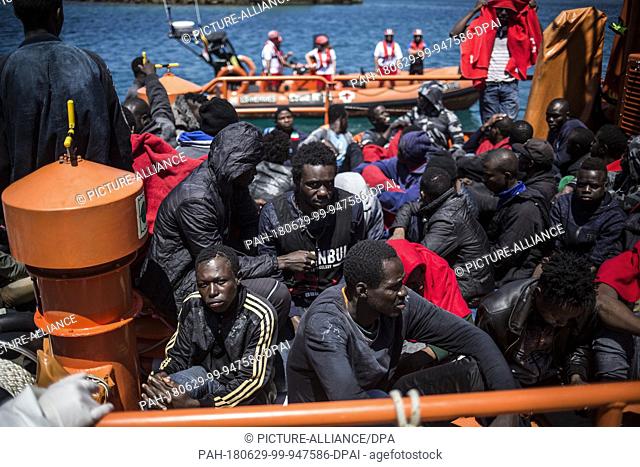 African migrants arrive after they have been rescued on high seas on the Strait of Gibraltar in Tarifa, Spain, 29 June 2018. Photo: Javier Fergo/dpa