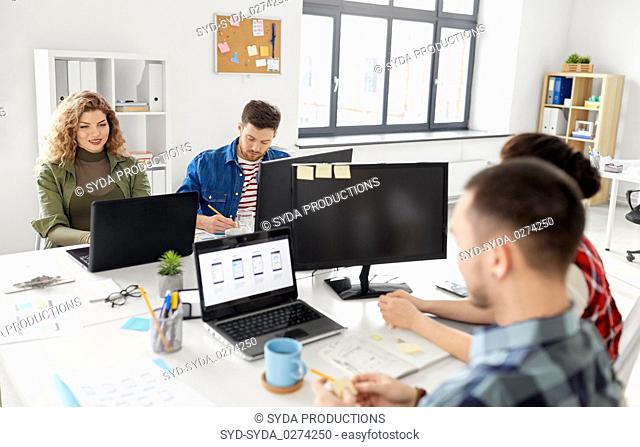 creative team working on user interface at office
