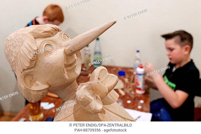 A wooden carving of Pinocchio in Anneberg-Buchholz, Germany, 04 March 2017. The town is hosting the 25th wood carving festival