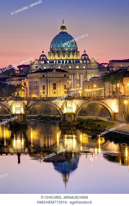 Italy, Lazio, Rome, historical center lited as World Heritage by UNESCO, Sant' Angelo bridge Sant' Angelo ponte above Tiber river and Saint Peter's basilica