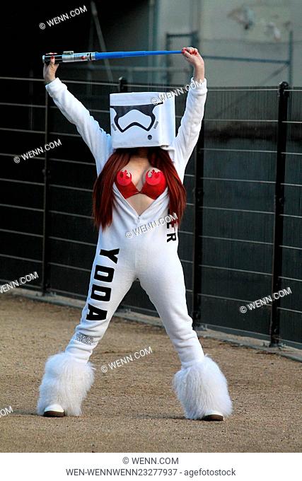 Phoebe Price poses dressed in a homemade white Yoda jumpsuit before heading to the cinema to line up for five days for the first showing of 'Star Wars - The...