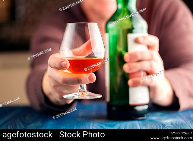 Man drinking malt whisky in relax time
