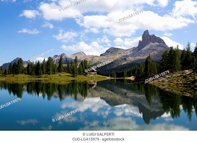 Lago Federa and the Croda da Lago G. Palmieri refuge, in the bacground Mount Becco di Mezzodì, Dolomites, Cortina d'Ampezzo, Veneto, Italy