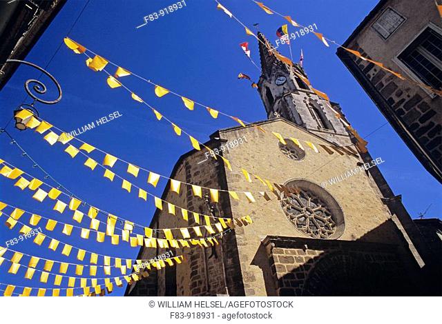 France, Poitou-Charente region, Vienne River valley, Confolen, old town, church tower with festive flags