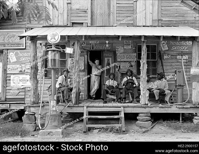 Sunday afternoon - country store on dirt road, Gordonton, North Carolina, 1939. Creator: Dorothea Lange