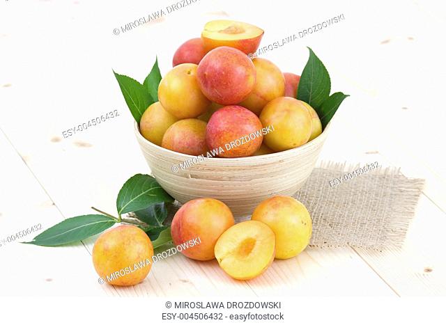 Fresh plums in the bowl