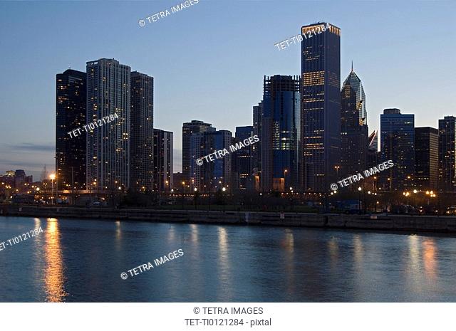 Skyline at night with Lake Michigan Chicago Illinois USA