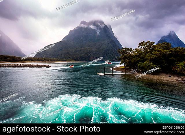 New Zealand - land of goblins and hobbits. Cold wind from Antarctica ruffles the water of the Milford Sound fjord. Concept of exotic