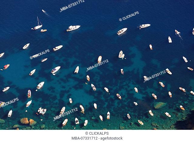 Tourist boats on Capri's sea from Solaro Mount, Anacapri, Capri Island, Naples province, Campania, Italy