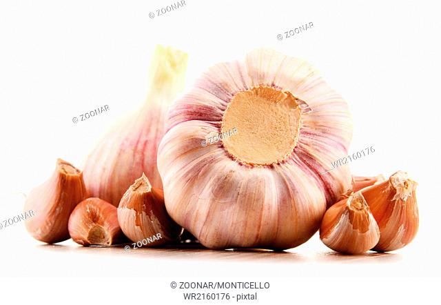 Composition with bulbs of garlic isolated on white background