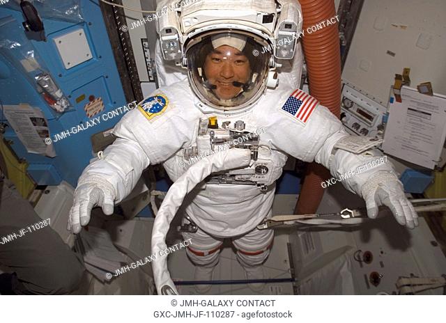 Attired in his Extravehicular Mobility Unit (EMU) spacesuit, astronaut Daniel Tani, Expedition 16 flight engineer, prepares for the mission's second session of...