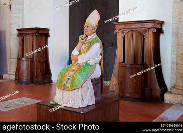 A thoughtful-looking figure of Pope Pius II in the Cathedral - Pienza, Tuscany, Italy