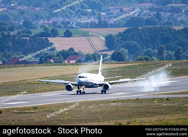 24 July 2020, Hessen, Calden: An Airbus with refugees from Greek refugee camps lands at Kassel-Calden (Kassel Airport). The German government has brought a...