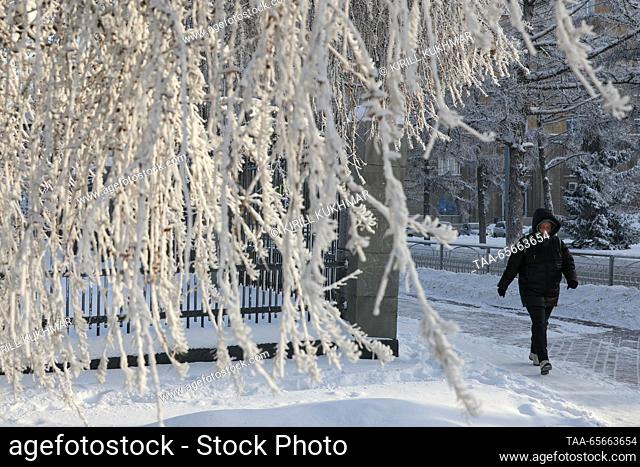 RUSSIA, NOVOSIBIRSK - DECEMBER 12, 2023: A man is seen in a park in Central District during severe frost in winter. On 11 December