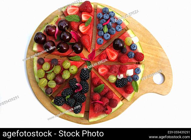 Sweet watermelon pizza with berries