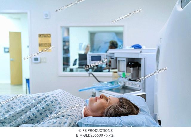 Caucasian patient laying at scanner