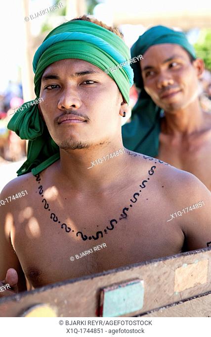 The warriors of Lapu-Lapu, a native chieftain of Mactan Island, getting ready for the battle at the Battle of Mactan reenactment or Kadaugan Festival  The...