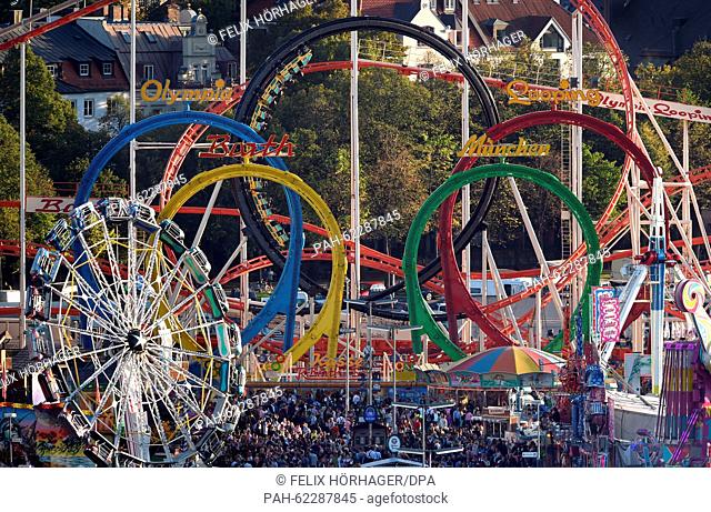 A looping rollercoaster at the 182nd Oktoberfest in Munich, Germany, 02 October 2015. The world's largest beer festival which will run until 04 October 2015 is...